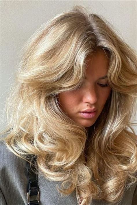 curly hair styles blonde|fluffy blonde hair girls curly.